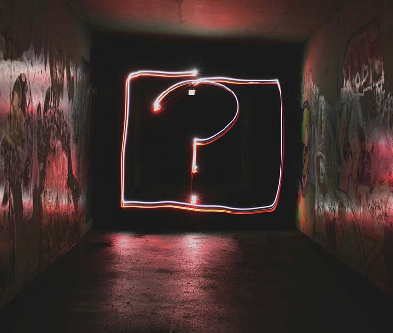 a photo of a square with a pink question mark in the center